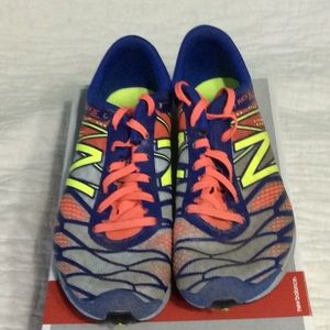 New balance track running shoes with cleats size 7.  B65